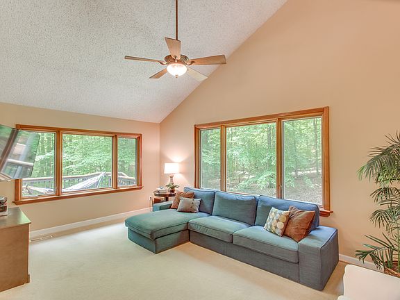 Living room w/ wooded views