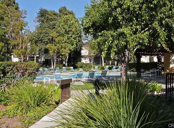 Inviting community pool and surrounding common space.