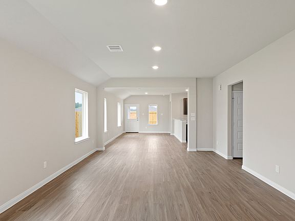 Family Room to Dining Area and Kitchen