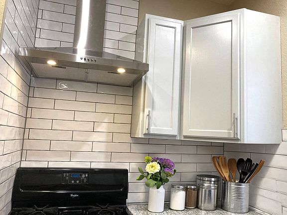 Oven with gas cooktop and vent hood
