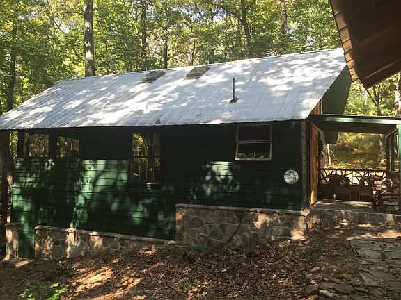 WOOD SLAB & STONE EXTERIOR