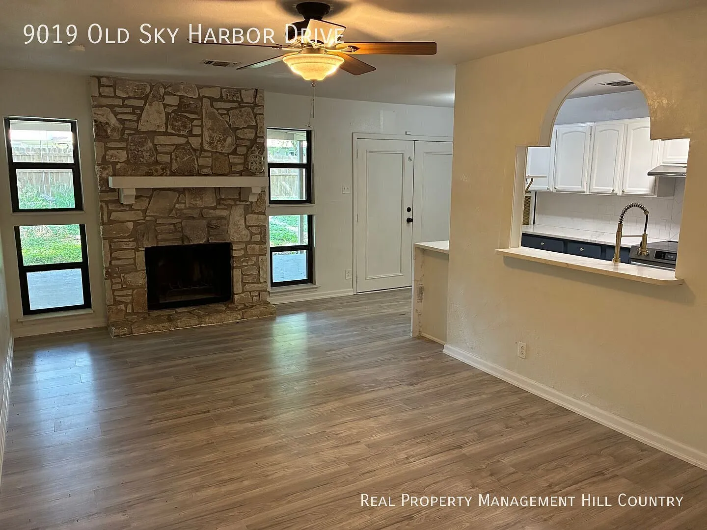 Renovated 5 Bed 2 Bath with Stone Fireplace + Quartz Kitchen — Photo 2