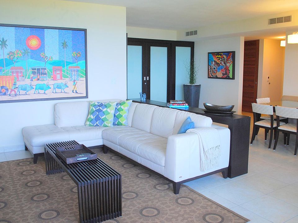 Open floor plan with modern decor and artwork