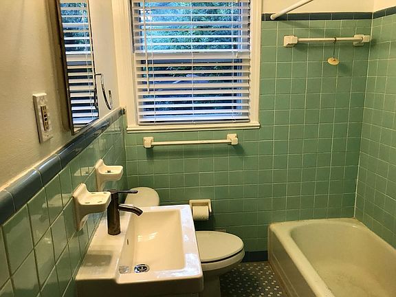 Bathroom with brand new sink & reglazed shower/tub