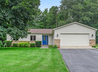 12366 Carriage Trail Dr, Springfld Twp, MI 48350