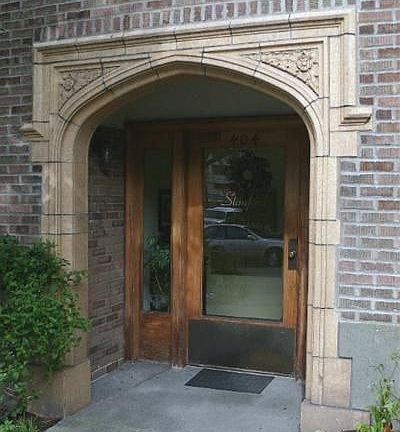 Arch Entryway with Terra Cotta and Original Wood Work