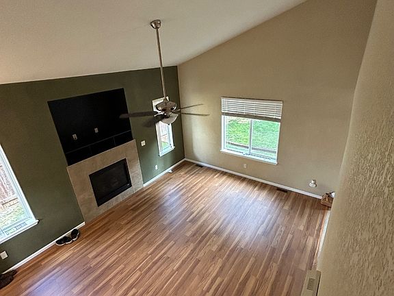 Cathedral ceiling, open floor plan, brand new fan/light.