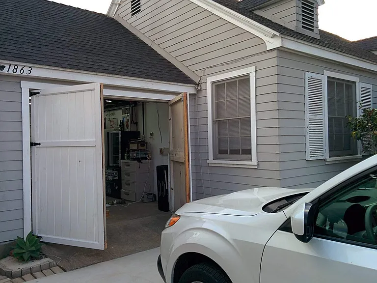 wide opening garage doors with 3 off street parking