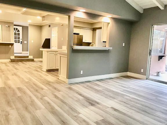 open floor plan: living room attached to kitchen