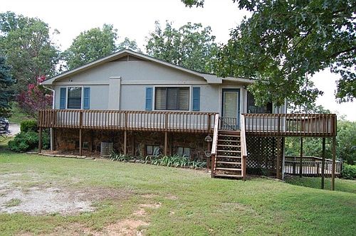 Deck wraps around home