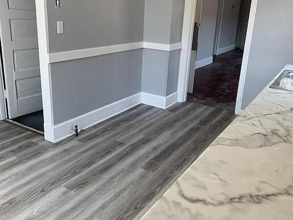 Basement stairs off kitchen, enters into dining room