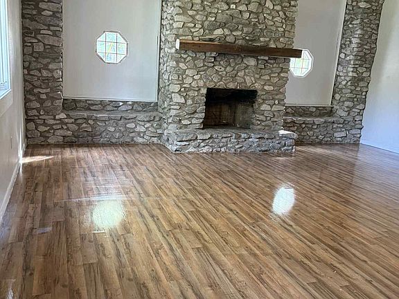 Beautiful, grand hand-laid stone fireplace in the family room!