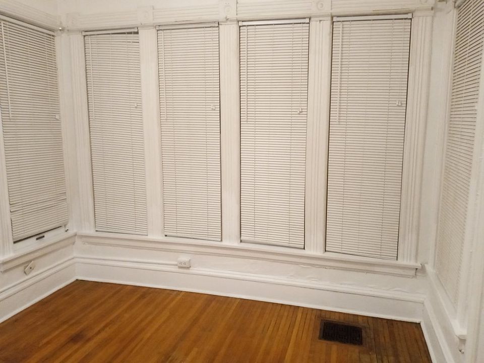 Living Room Bedroom with Tall Windows