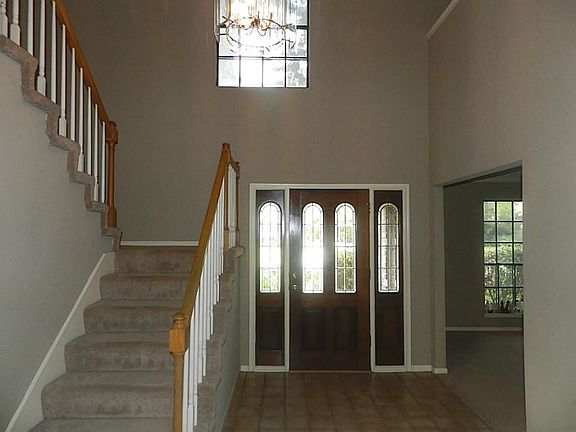 2-Story Entry Open to the den overlooking  Overlooking Pool!