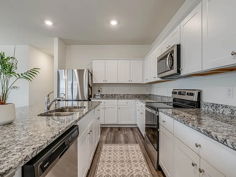 Like-new appliances. Refrigerator is 27+sq ft and beautiful (all kitchen appliances are staying in the home)