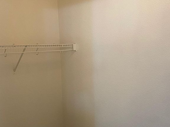 One side of the master closet