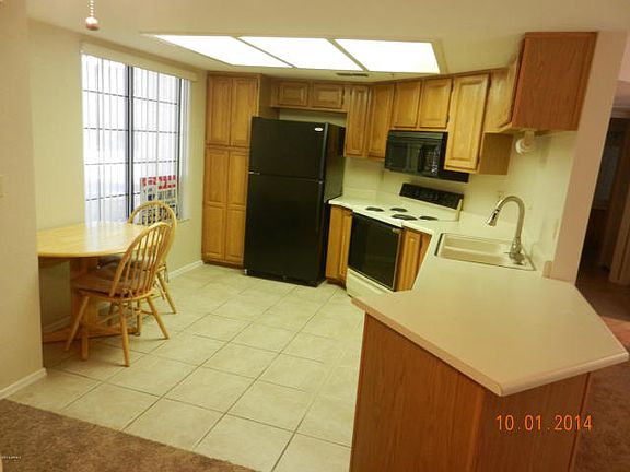 3rd image of 9710 N 94th Pl Unit 115