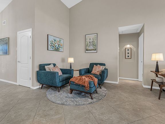 Sitting area with view of tv.