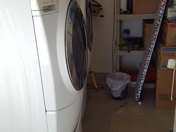 Shared laundry room is inside off spa room. Free to use, upd