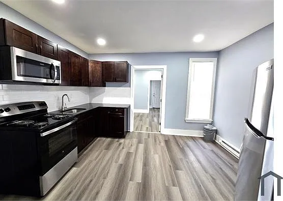 6542 Regent St — Photo 5