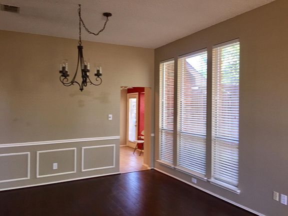 living area w/ access to kitchen