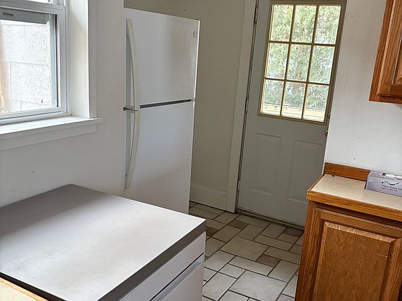 kitchen/pantry and rear door to private deck