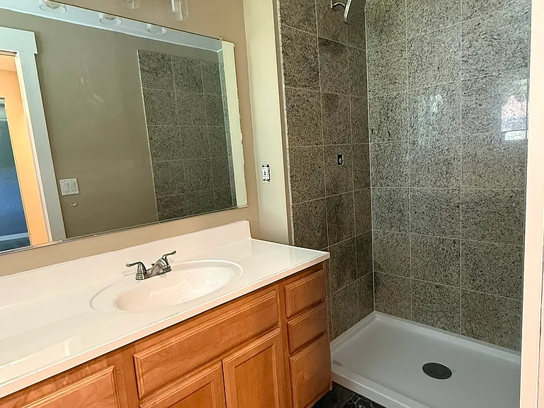 Master Bath (2nd photo). Nice large shower. Glass door will be installed.