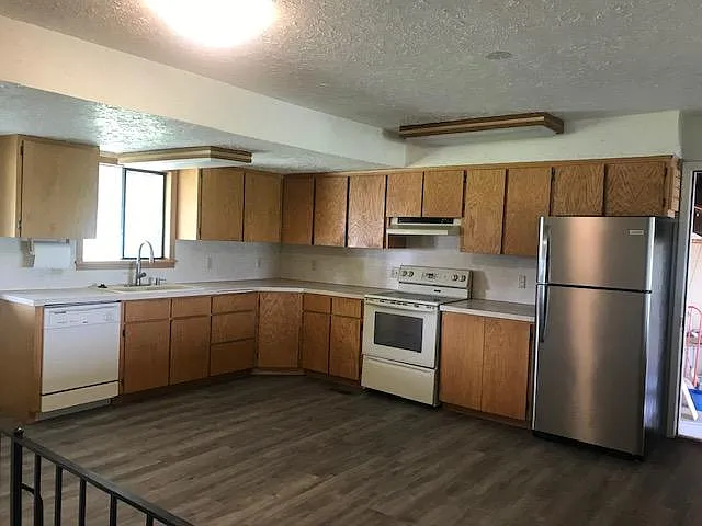 Eat-In Kitchen w/ Rear & Garage Exits is OPEN to Great Room.