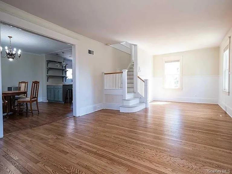 Living Room into Dining Room and Kitchen