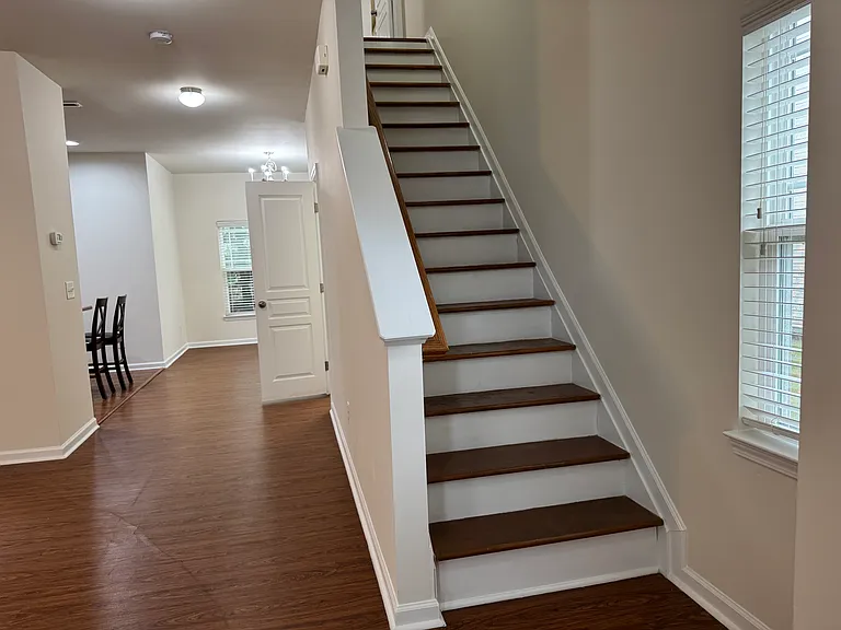 View to kitchen and upstairs from front entrance