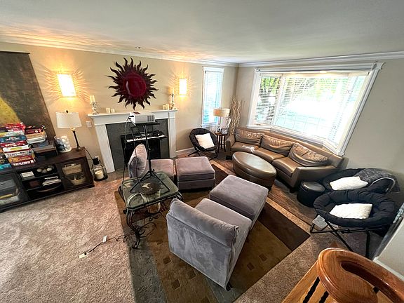 Multiple living room spaces & games/cards, gas fireplace