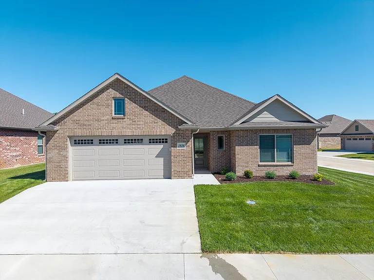 1816 Wes Milligan Ln — Photo 1