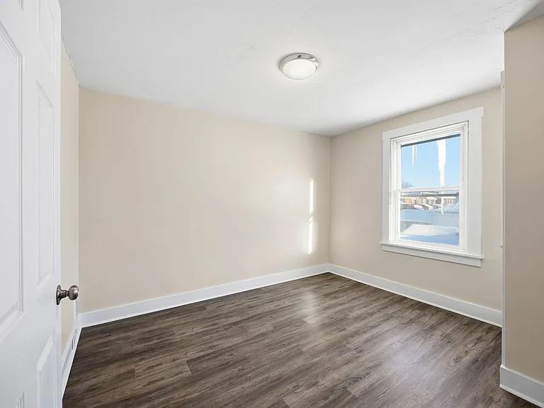 Charming Updated 2BR Home with New Flooring & Rear Porch — Photo 6