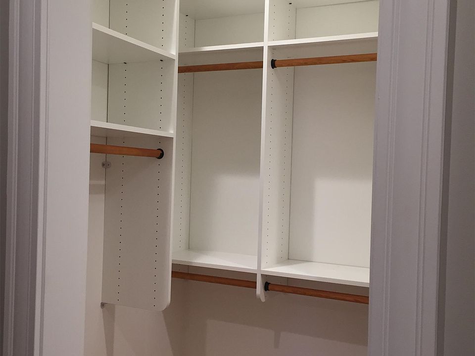 Walk-in closet in Master Bedroom in Unit A. 11 linear feet of hanging space!