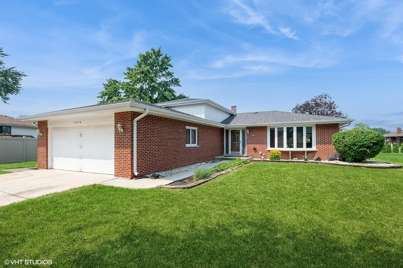 15316 Woodmar Dr photo 1