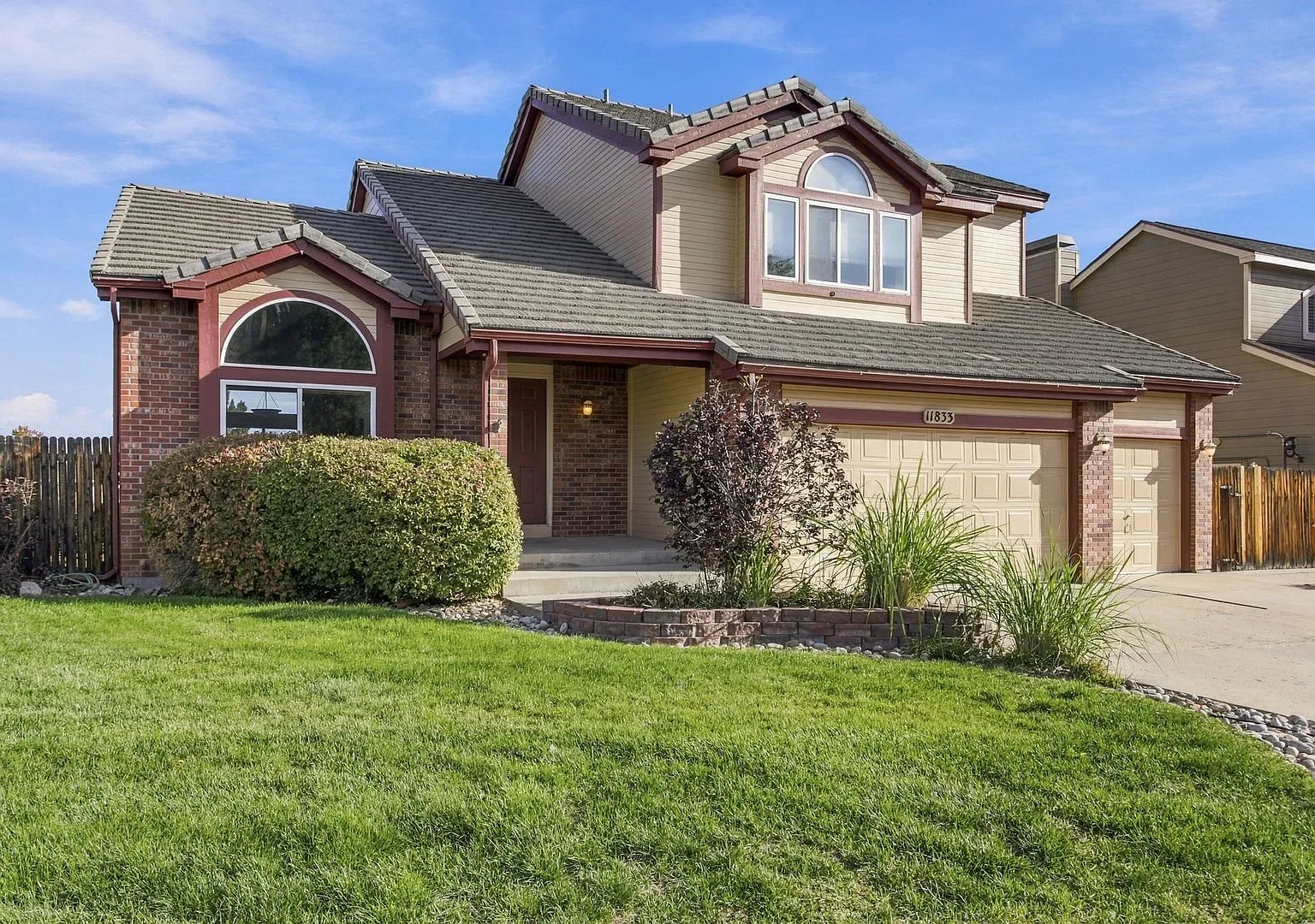 Spacious 4 Bedroom Home with Finished Walk-Out Basement, 3-Car Garage & Large Yard — Photo 1