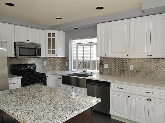 newly remolded kitchen with island and appliances
