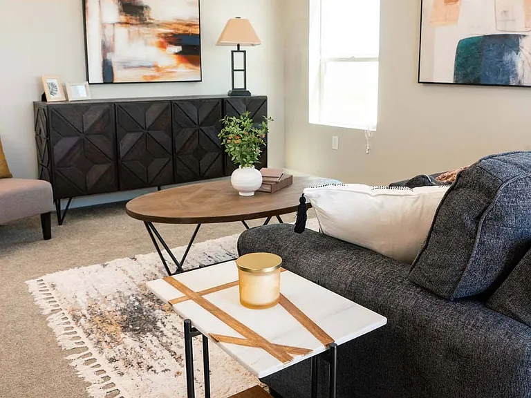 Natural lighting coming into a living room at Heartland Flats Alliance.