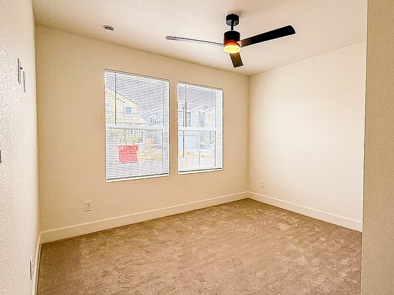 Downstairs Bedroom - Three additional bedrooms perfect for kids, guests, or a home office
