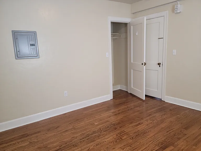 Bedroom 1 with door and closet