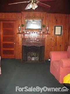 Living Room : 16 X 13 Carpet over hardwood.