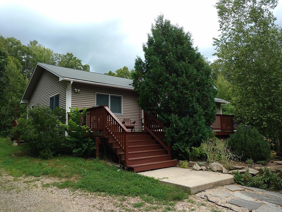 Front of house--deck full length of house