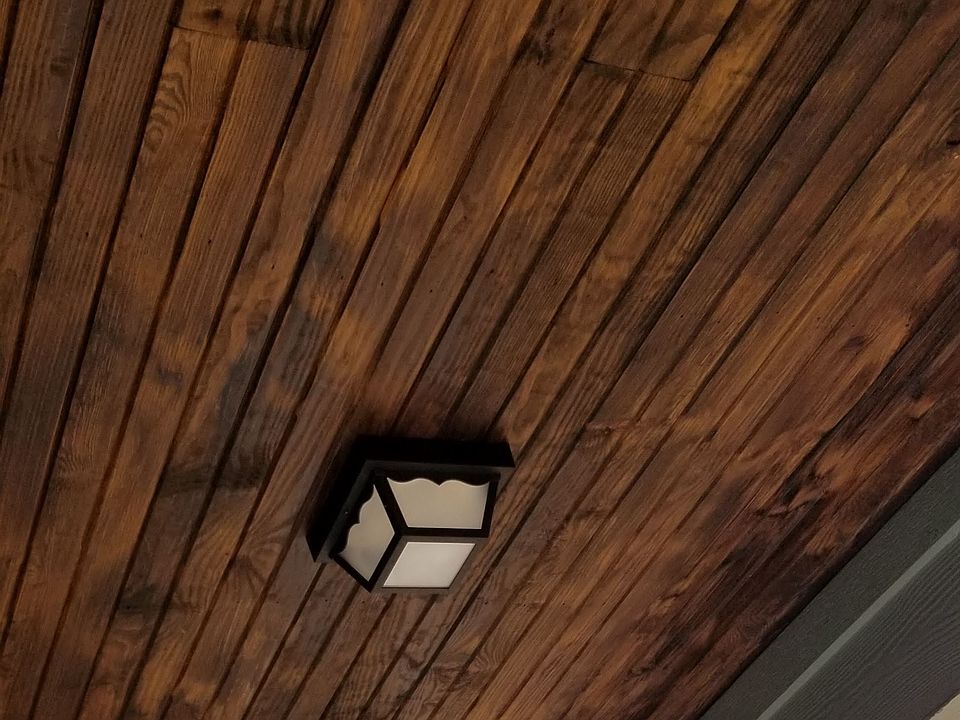 Plan I tongue and groove covered patio ceiling with light
