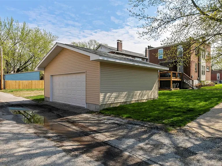Two car garage with alley access. large backyard