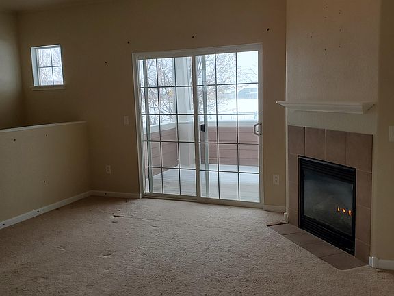 LR with access to inviting deck. Gas FP. New carpet.