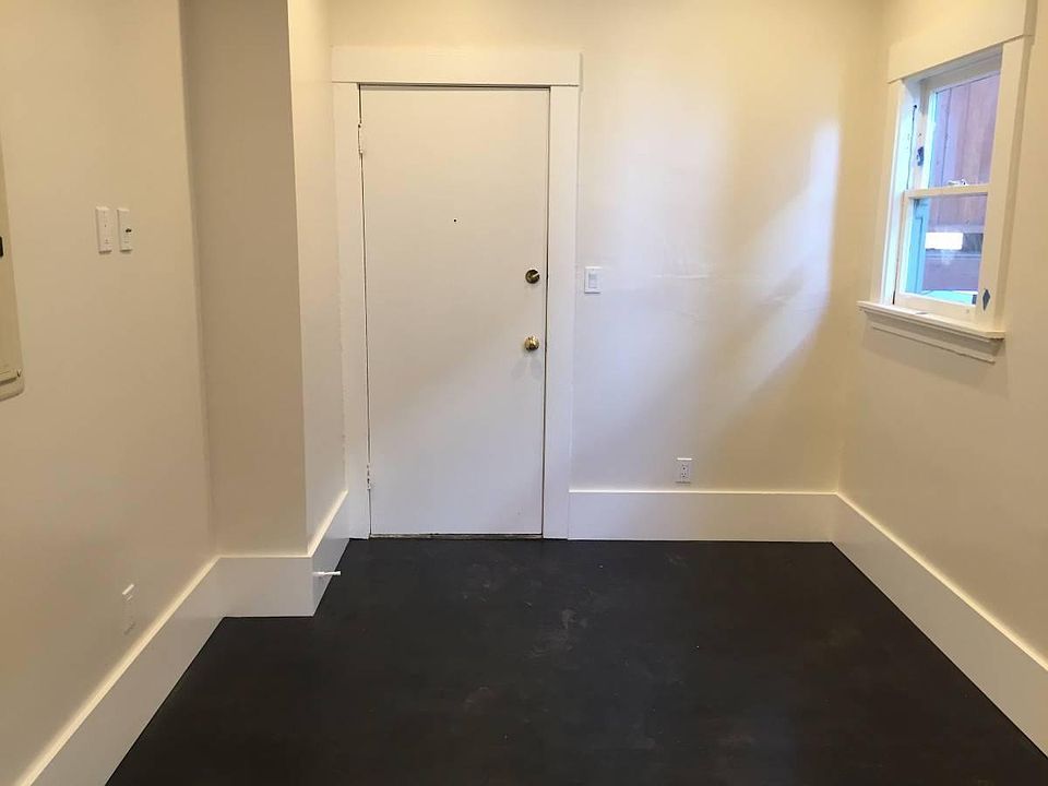 Dining Area with Door Leading to Garden / Rear Stairs