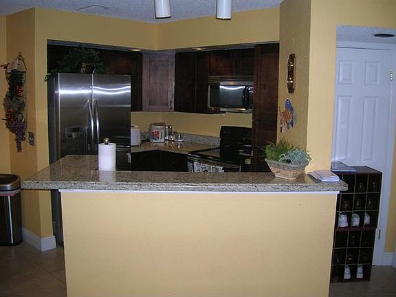 5th image of 3470 Pinewalk Dr N APT 217