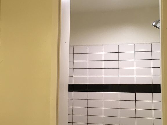 Tiled, enclosed shower