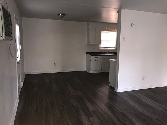Living room view into dining nook