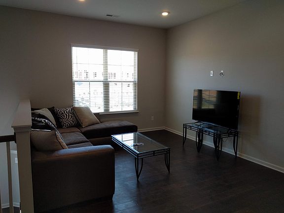 Living room (pictured furnishings are not included)